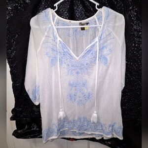 A Tommy Bahama sheer v-neck boho tunic top/ Cover Up with tassels in a small.